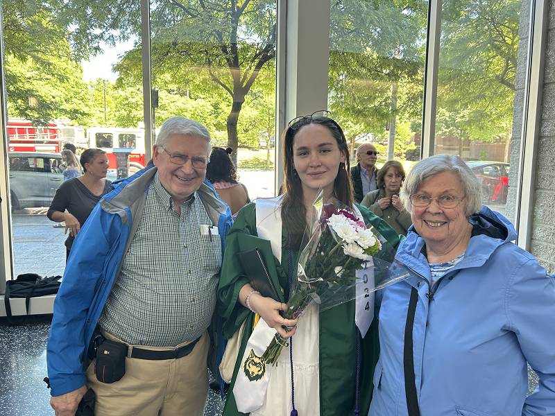[ Gen and Joe with Abby at her graduation ]